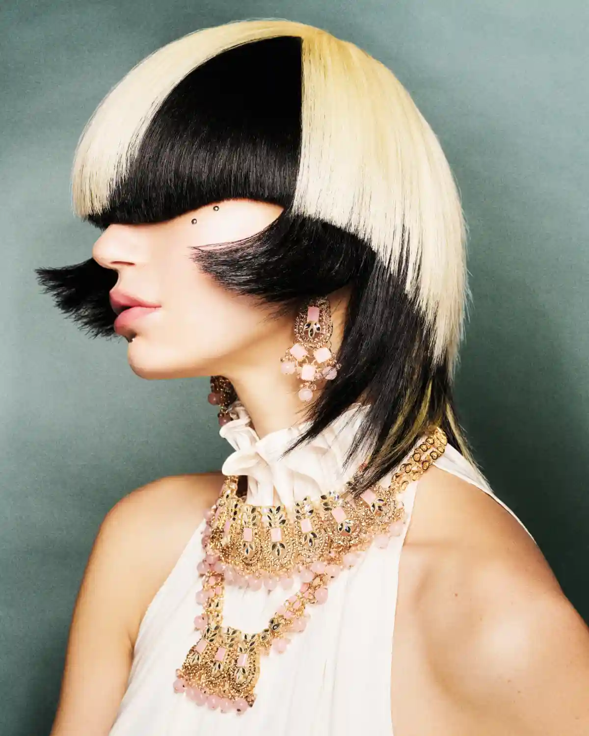Model with short blonde and black hair from the Morphion Collection by Let Lew.