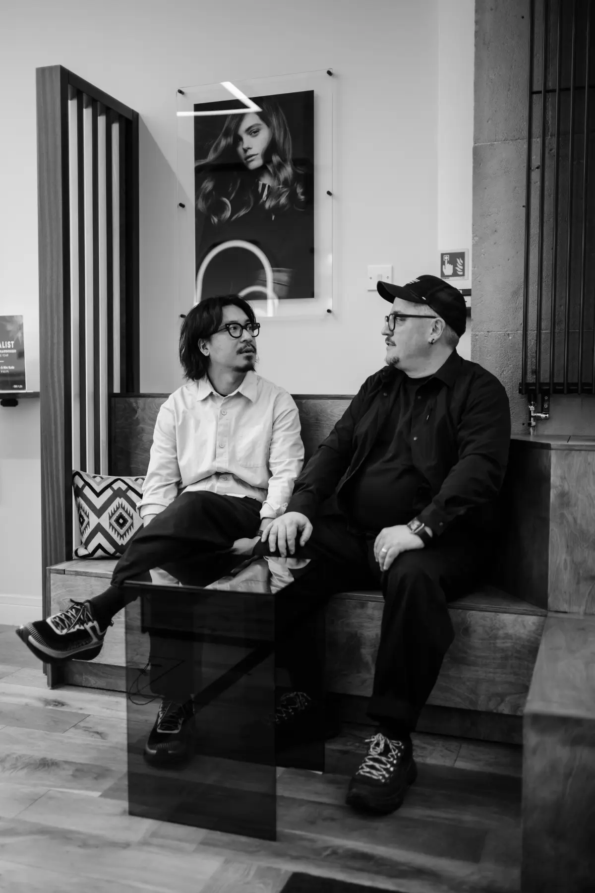 Black and white photo of KIKU Salon's owners.