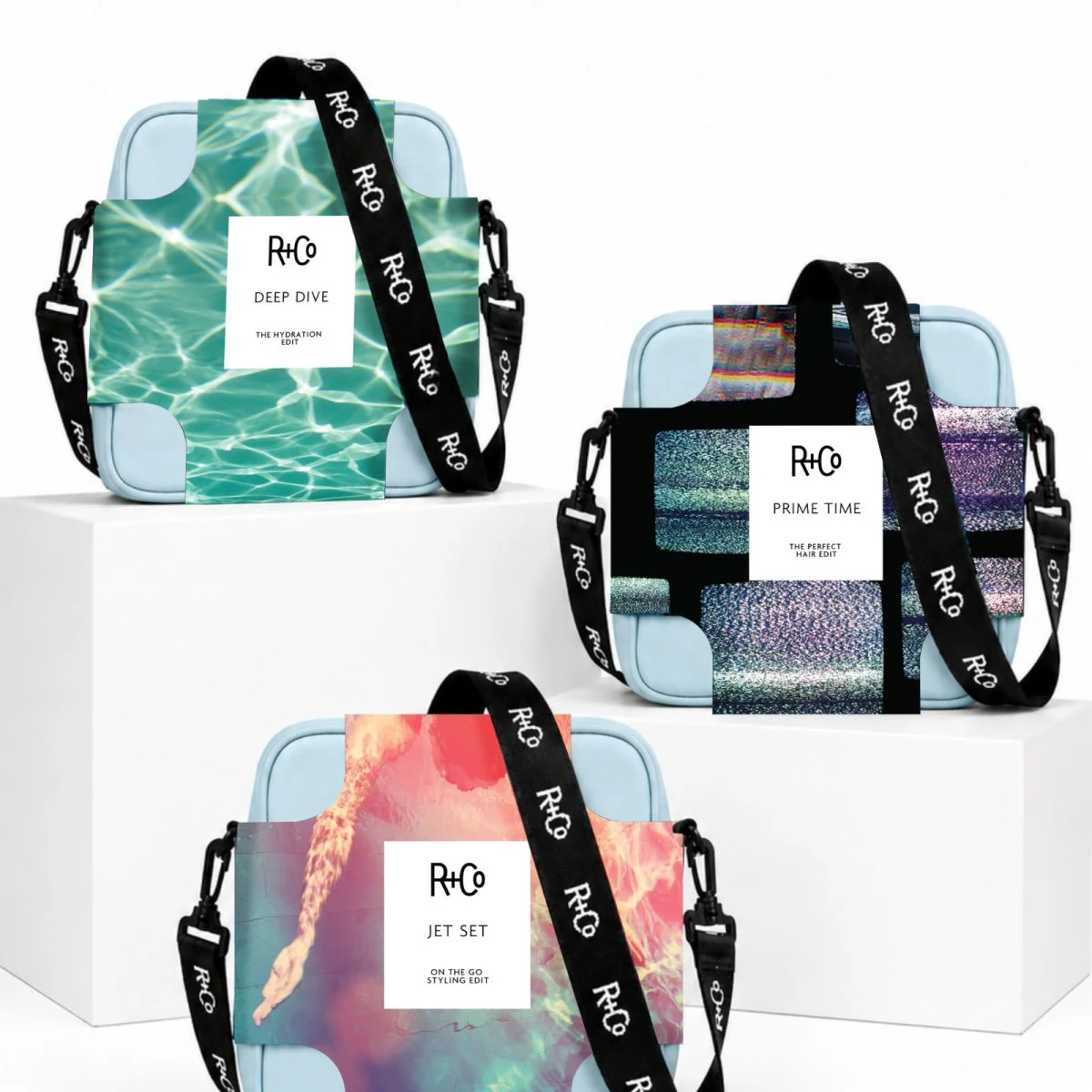 Three R+Co holiday gift sets; crossbody bags with product inside.