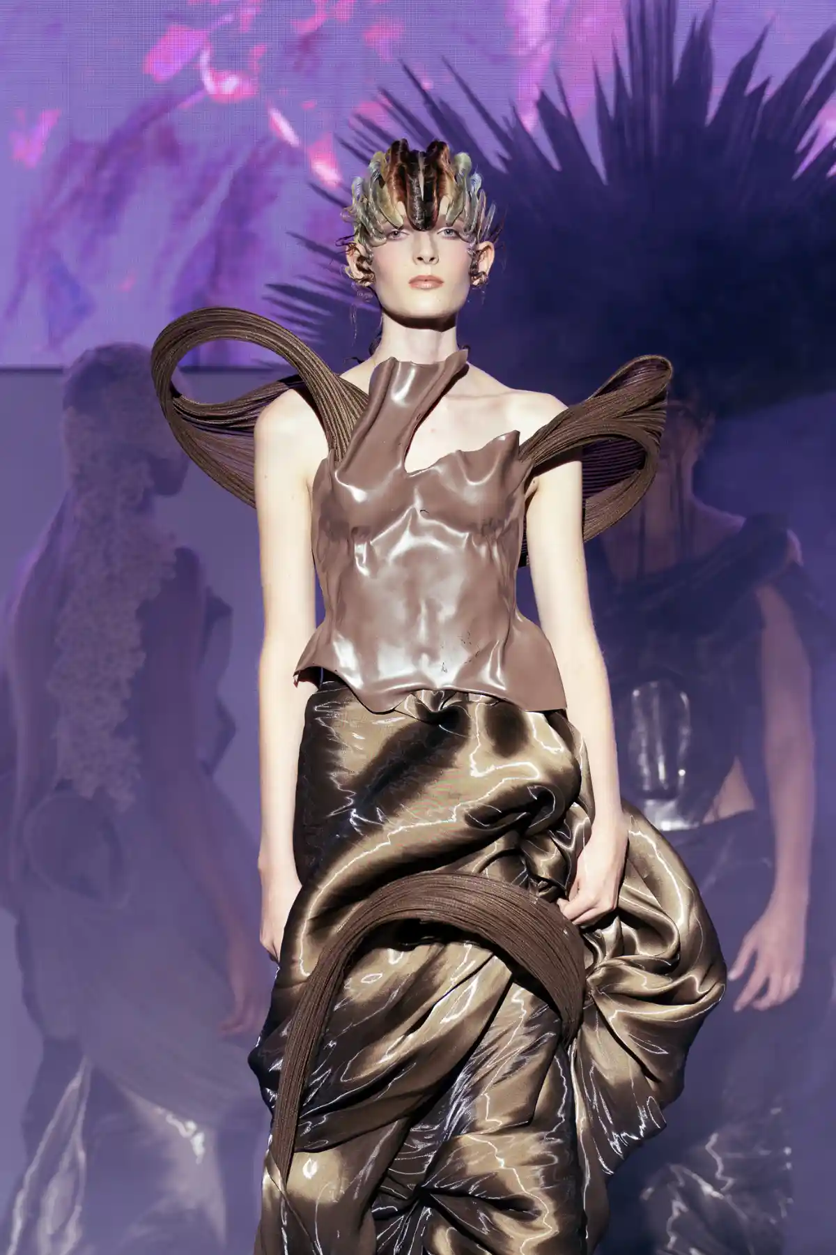 Model on stage at Salon International 2026