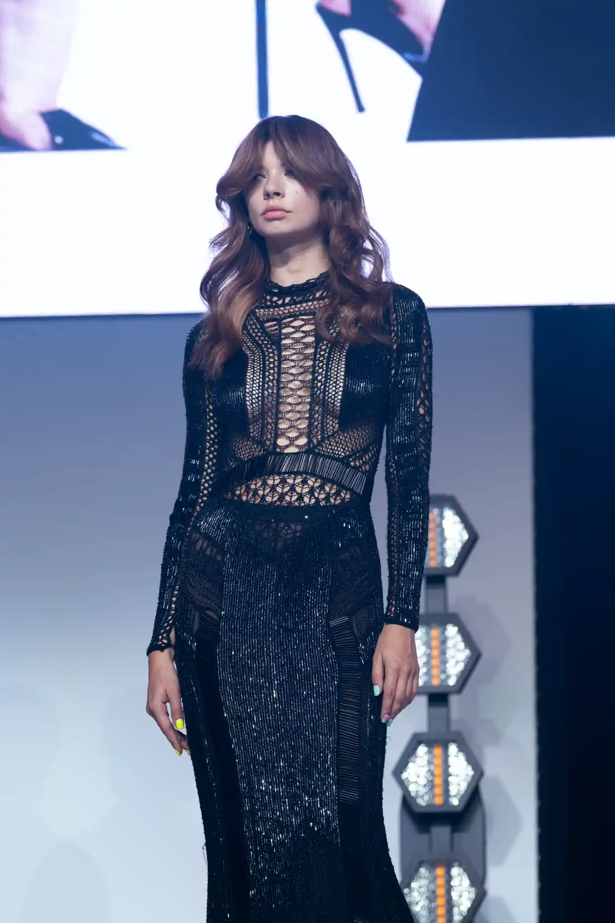 Model on stage at Salon International 2026