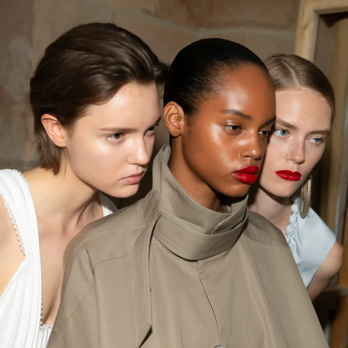 Three models at Victoria Beckham SS27 show PFW.