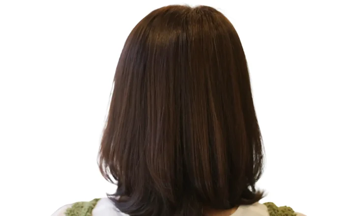 A woman with short brown hair.
