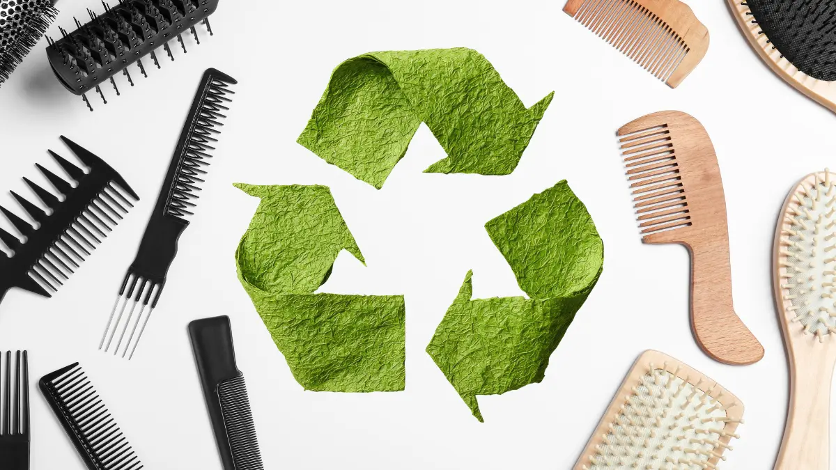 Hair tools with a recycle symbol in the centre.